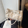 Creamy white pleated cloud bag with a stylish woven rope handle and smooth PU finish - White