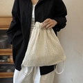 Chic cream white crochet knit drawstring bucket bag with hollow mesh design for women - Off White