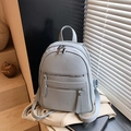Light greyish blue backpack in lychee grain leather with triple zip and silver hardware - Blue