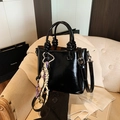 Minimalist black glossy bucket bag with creative charms and adjustable shoulder strap - Black (With Pendant)