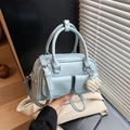 Light blue Boston bag in synthetic leather with a heart pearl charm and shoulder strap - Blue (With Charm)