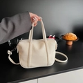 Borsa a mano Boston in pelle bianco crema con tracolla regolabile e finiture argento - Bianco