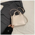 Minimalist beige bucket bag with knotted handles and adjustable crossbody strap - White (Without Charm)