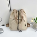 Vielseitiger Rucksack in Creme mit Kordelzug, Tragegriffen und leichtem Canvas-Stoff - Cremeweiß