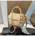 Elegante borsa a mano color crema in pelle martellata con tracolla regolabile e manici - Bianco Sporco