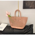 Detail of pink silicone woven jelly bag basket with cut-out pattern for beach and picnic - Khaki
