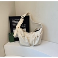 Minimalist cream nylon crossbody bag with wide adjustable strap and large capacity - Off White
