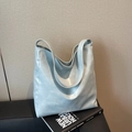 Minimalist light blue tote bag in matte faux leather with matching wide shoulder strap - Blue