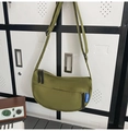 Olive green crescent crossbody bag with double zippers and adjustable shoulder strap - Green