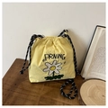Sac seau jaune en nylon avec broderie marguerite et bandoulière tressée à cordon - Broderie Marguerite PRNING / Jaune