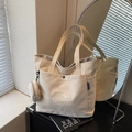 Cream canvas tote bag with large front pocket and matching round mini coin purse - Off-white