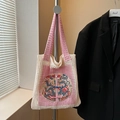 Pink and white woven tote bag featuring an intricate Chinese dragon embroidery patch - Pink