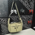 Khaki canvas crossbody dumpling bag with dual utility pockets and wide strap - Green