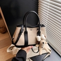 Canvas bucket bag in beige and black leather with cute plush dog pendant charm - Black with Pendant