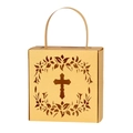 Detail of laser-cut cross and floral patterns on golden paper gift box for celebrations - Gold