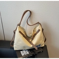 Minimalist canvas tote bag with brown leather straps and large capacity for commuting - Khaki
