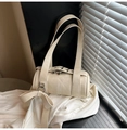 Beige Boston barrel bag in faux leather with silver buckle and matching bow charm - White