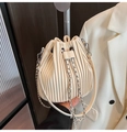 Chic cream white pleated bucket bag with silver metal chain drawstring closure and strap - Off White
