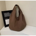 Macro detail of the brown lightweight nylon fabric on this minimalist tote bag - Coffee