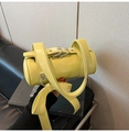 Sac Boston cylindrique jaune citron en cuir avec grand nœud et boucles argentées - Jaune