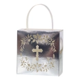 Macro detail of silver cross gift box with intricate laser-cut floral wreath patterns - Reflective Silver