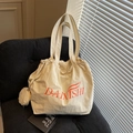 Minimalist off-white canvas tote bag with red lettering and small round zipper pouch - Khaki