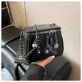 Detailed view of black pleated mini bucket bag with silver camellia and chain strap - Large / Black