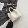 Elegant white lychee leather bucket bag with knot handle detail and adjustable strap - White Without Pendant