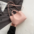Pink lychee grain faux leather bucket bag with knotted handle and adjustable strap - Pink Without Pendant