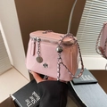 Pink embossed leather crossbody bag with camellia metal charms and chain strap - Large / Pink