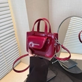 Glossy burgundy patent leather square handbag with adjustable shoulder strap - Red