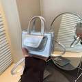 Silver metallic mini square handbag with top handles and adjustable crossbody strap - Silver