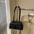 Minimalist black lychee leather pillow bag with dual front pockets and silver rings - Black without Pendant