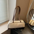 Beige woven pillow shoulder bag with brown leather trim and long adjustable strap - Brown