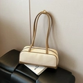 Contrast Boston bag in beige canvas and brown leather on a woven stool - Brown