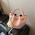 Pink lychee texture bucket bag with a cute white plush puppy charm accessory - With Pendant / Pink