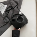 Chic black litchi grain bucket bag with circular handles and a detachable strap - No Pendant / Black