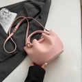 Chic pink pebble leather bucket bag with top handle and adjustable shoulder strap - No Pendant / Pink