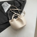 Chic cream white bucket bag with litchi grain leather and knotted handles - No Pendant / Off White