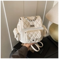 Quilted cream leather backpack with silver metal chain handle and flap pockets - White