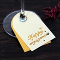 Detail of Happy Engagement wine glass tag with laser-cut hearts on a wooden table - 10cm / Jewelry Star and Gold