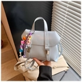 Light blue faux leather backpack with vertical straps and colorful alphabet charm - With Charm Style / Blue