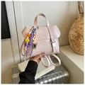 Women's light pink faux leather bucket backpack with colorful beaded letter charm - With Charm Style / Pink