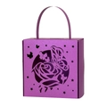 Close-up of laser-cut butterfly and rose pattern on purple hollow gift box with handle - Dark Purple