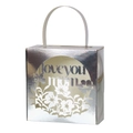 Close-up of silver laser-cut gift box with floral patterns and Love You Mom text - Reflective Silver