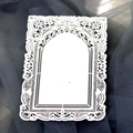 Intricate laser-cut white lace decorative paper card with elegant arched window design - White
