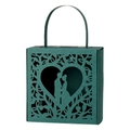 Detail view of dark green laser-cut wedding favor box with romantic heart silhouette - Ink Green