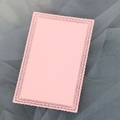 Pink rectangular laser-cut lace card on grey mesh fabric for wedding DIY and journaling - Pink