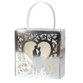 Close-up of laser-cut silver wedding candy box with heart-shaped couple silhouette - Reflective Silver