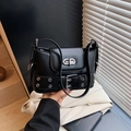 Black vegan leather shoulder bag with silver double ring twist lock and buckle detail - Black